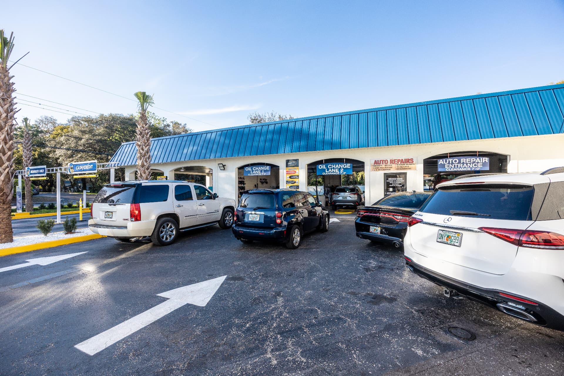 Oil change and auto repair lanes alongside the Sunshine Car Wash on East Fowler Avenue