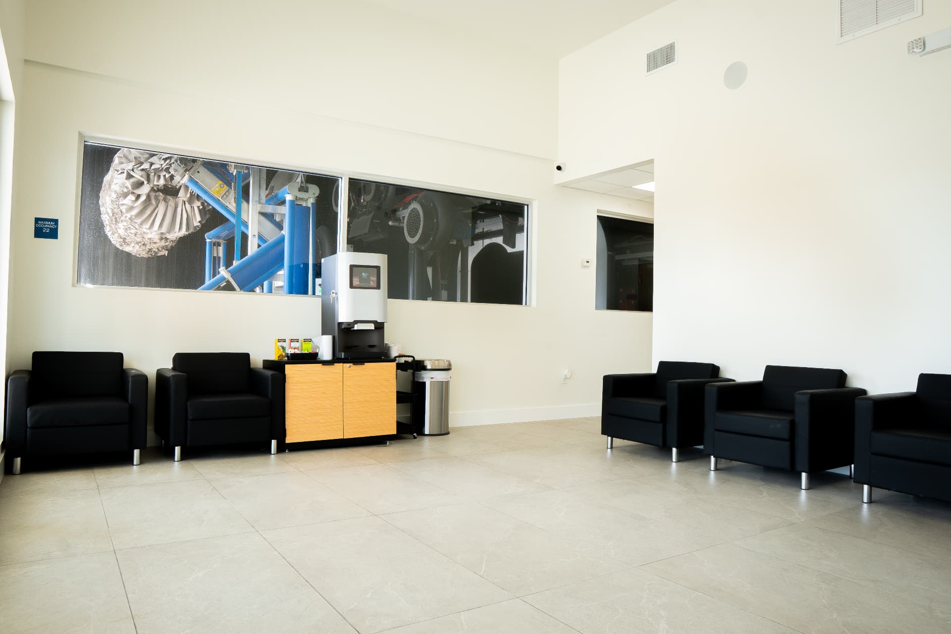 Bright guest lounge with comfortable seating at Sunshine Ulmerton Road