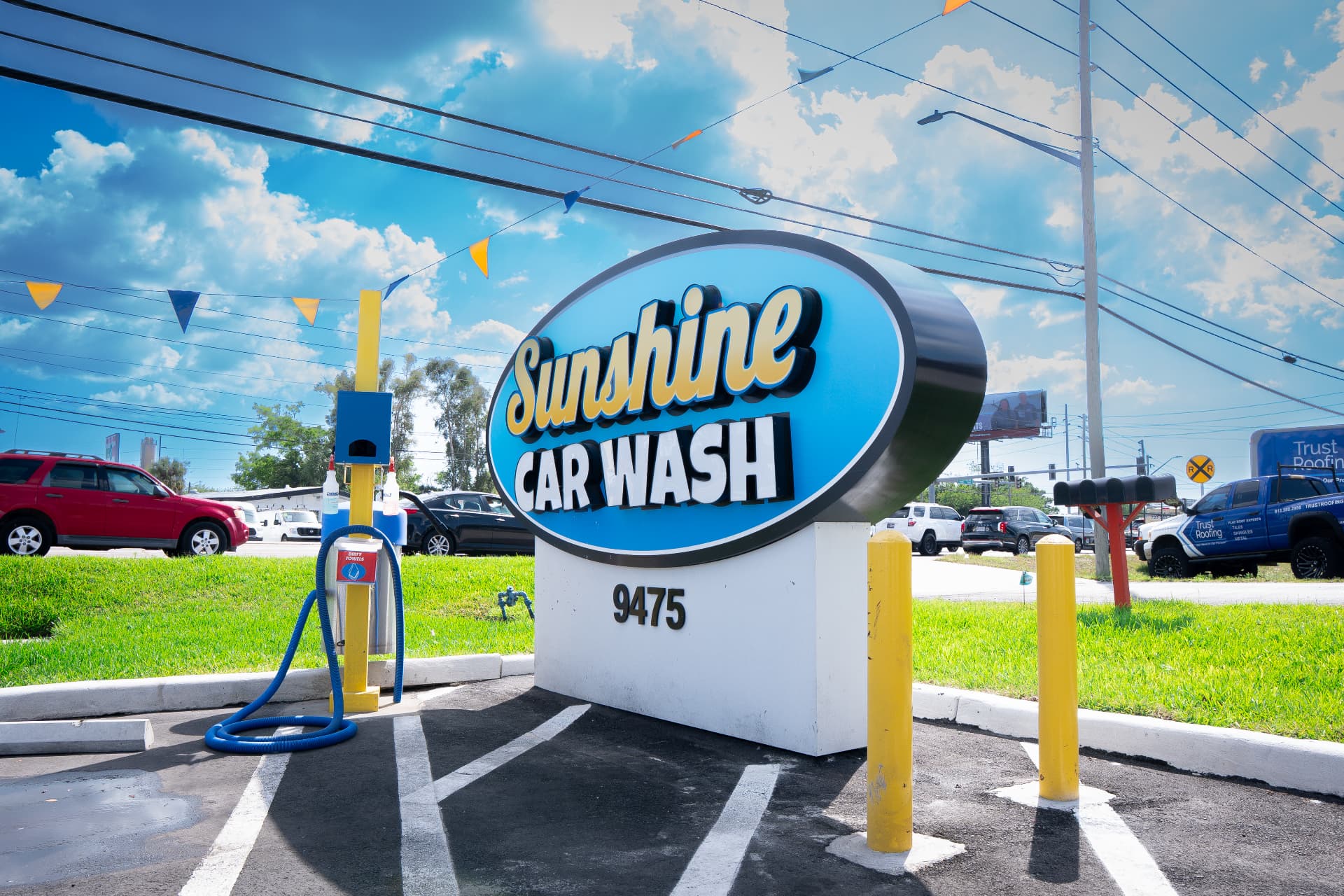 Sunshine Car Wash monument sign displaying the 9475 Ulmerton Road address